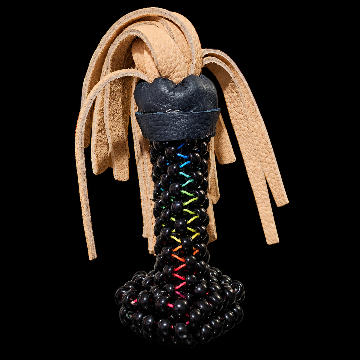Black beaded kandi whip with rainbow cord detailing and tan leather tails