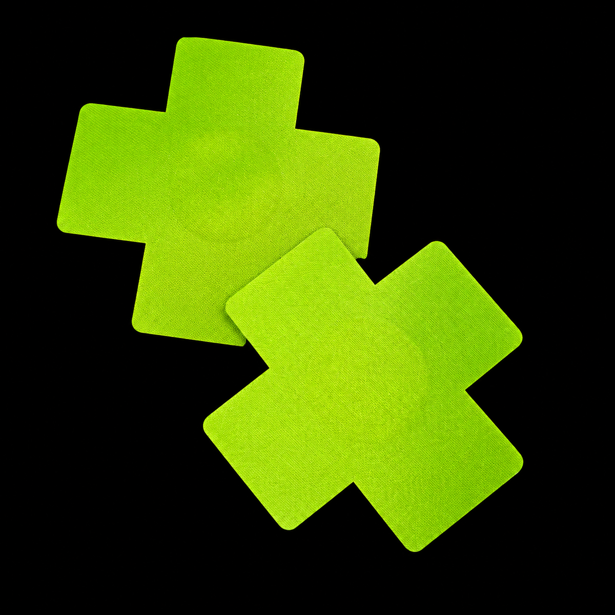 Pair of neon green cross-shaped pasties on black